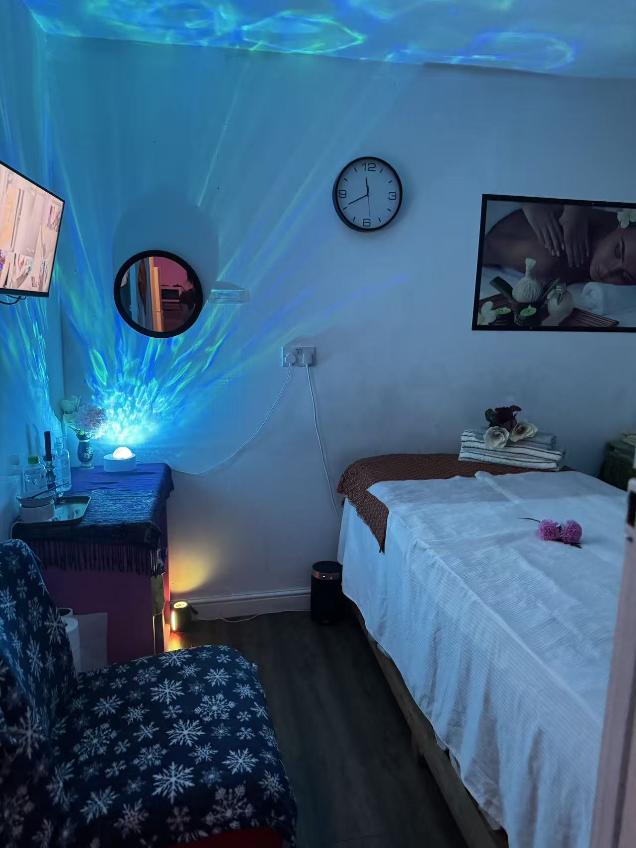 Relaxing treatment room with ambient blue lighting